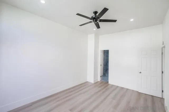 a view of a livingroom with a hardwood floor