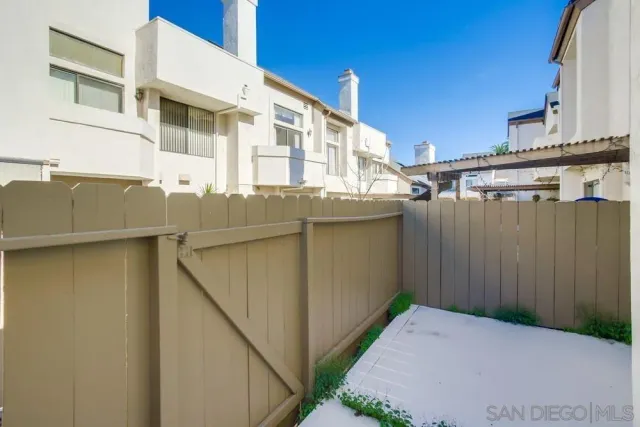 a view of living room with furniture and window