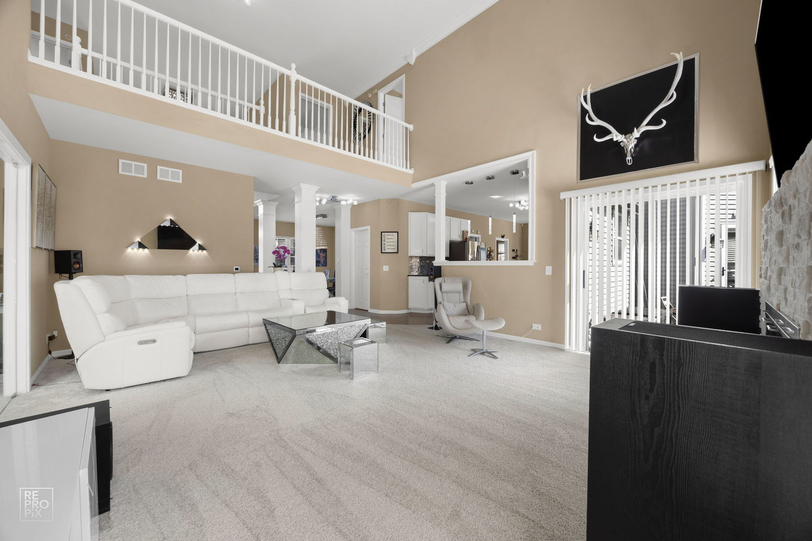 134 Timber Court Gilberts, IL 60136 - Photo 12 of 35 a living room with furniture and a flat screen tv