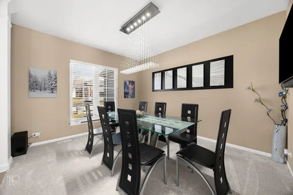 a view of a dining room with furniture