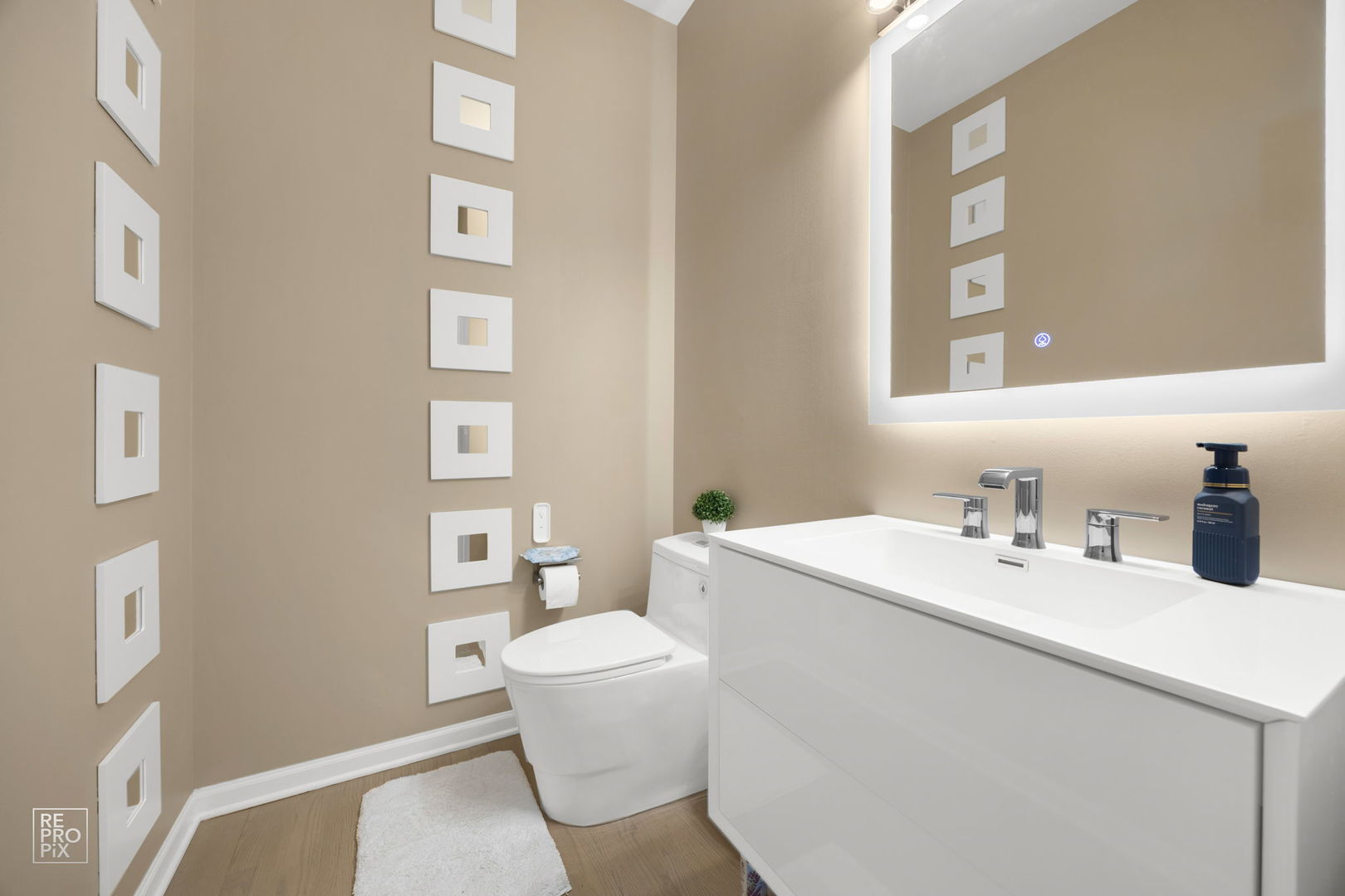 134 Timber Court Gilberts, IL 60136 - Photo 17 of 35 a bathroom with a sink a toilet and a mirror