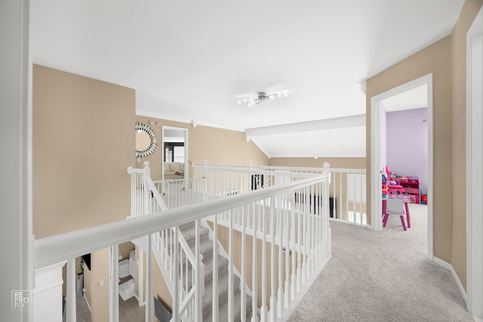 134 Timber Court Gilberts, IL 60136 - Photo 19 of 35 a view of staircase with railing and white walls
