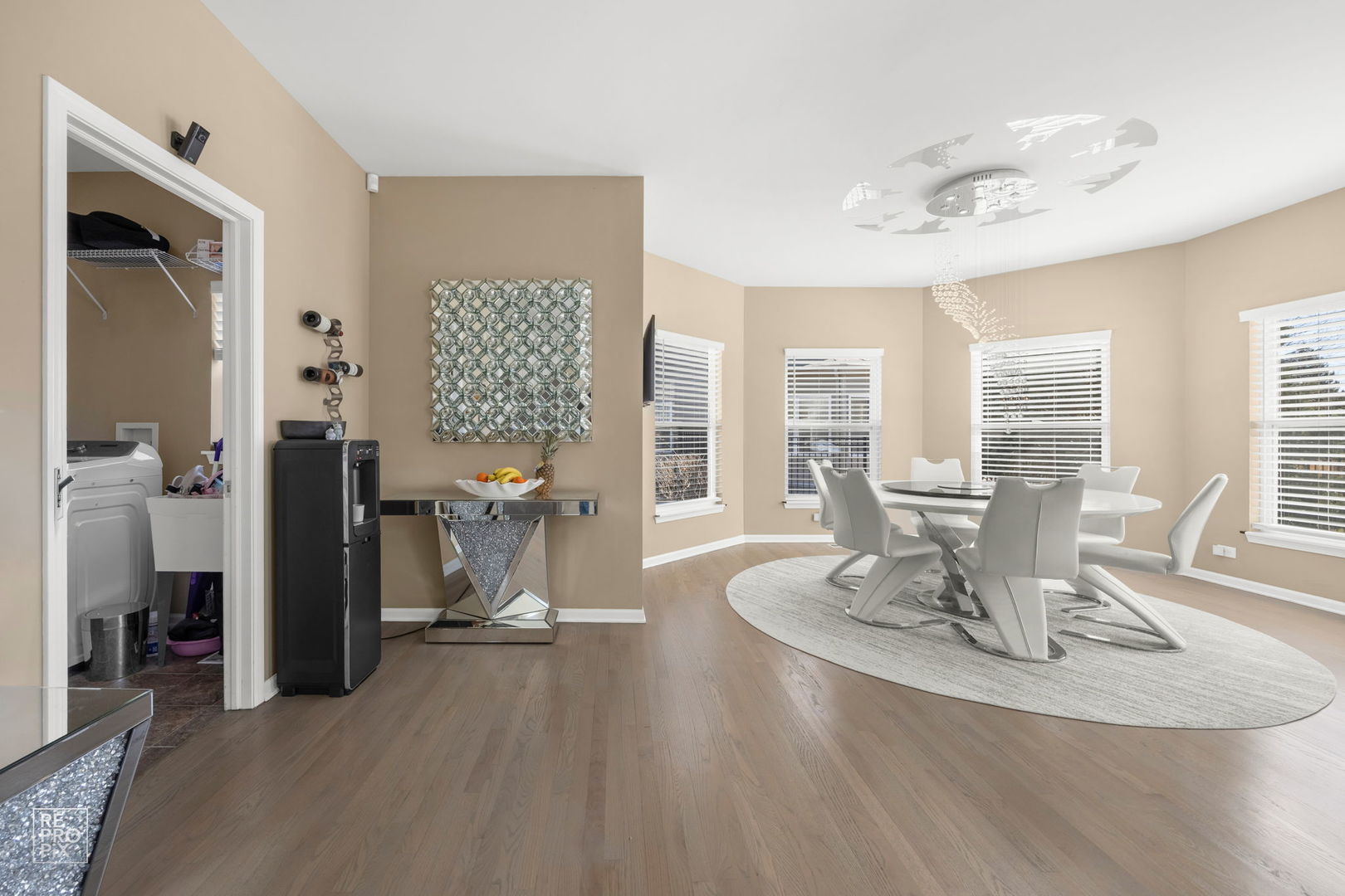 134 Timber Court Gilberts, IL 60136 - Photo 7 of 35 a living room with furniture a dining table and chairs