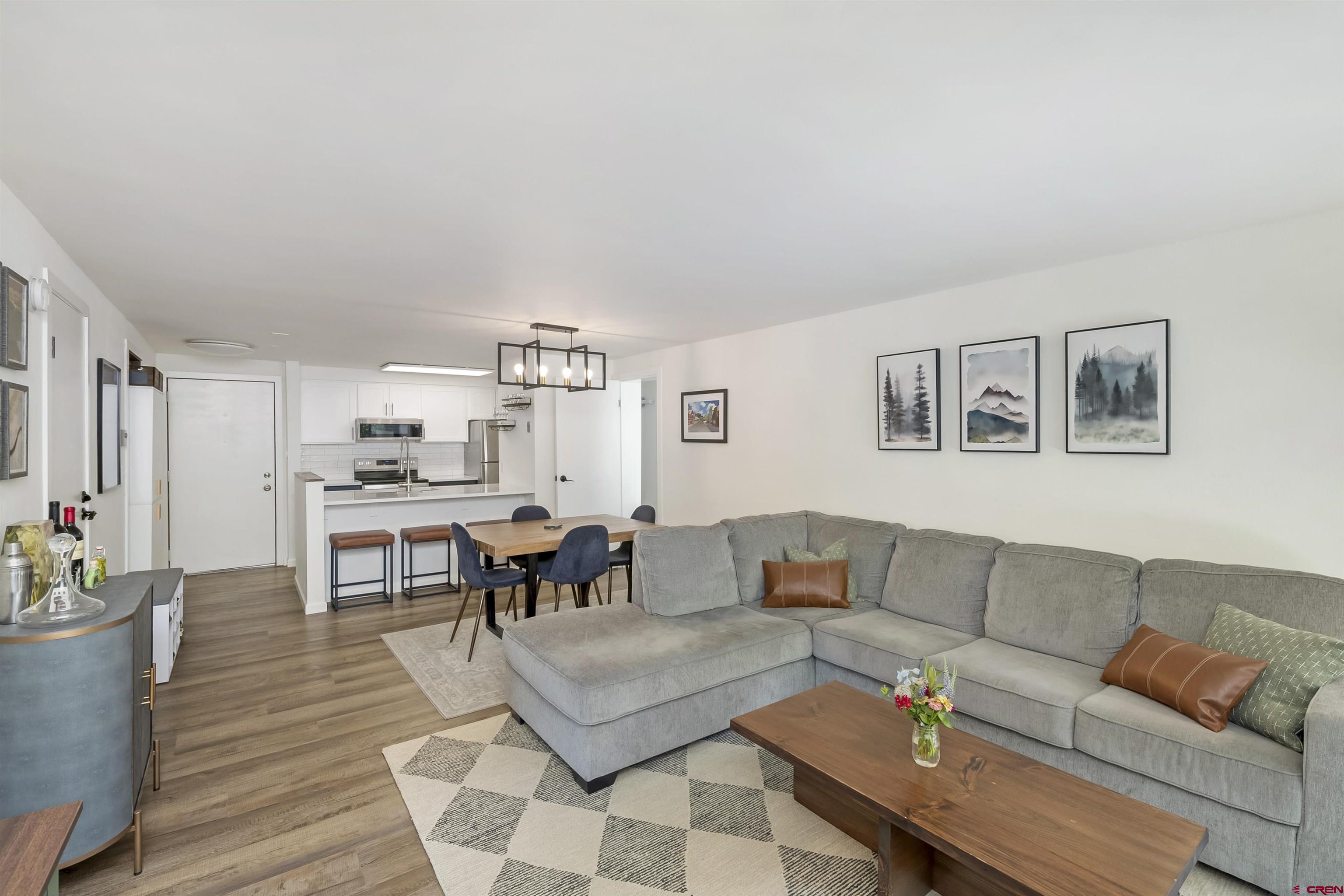 651 Gothic Road, Unit 511 Crested Butte, CO 81225 - Photo 15 of 34 a living room with furniture and wooden floor