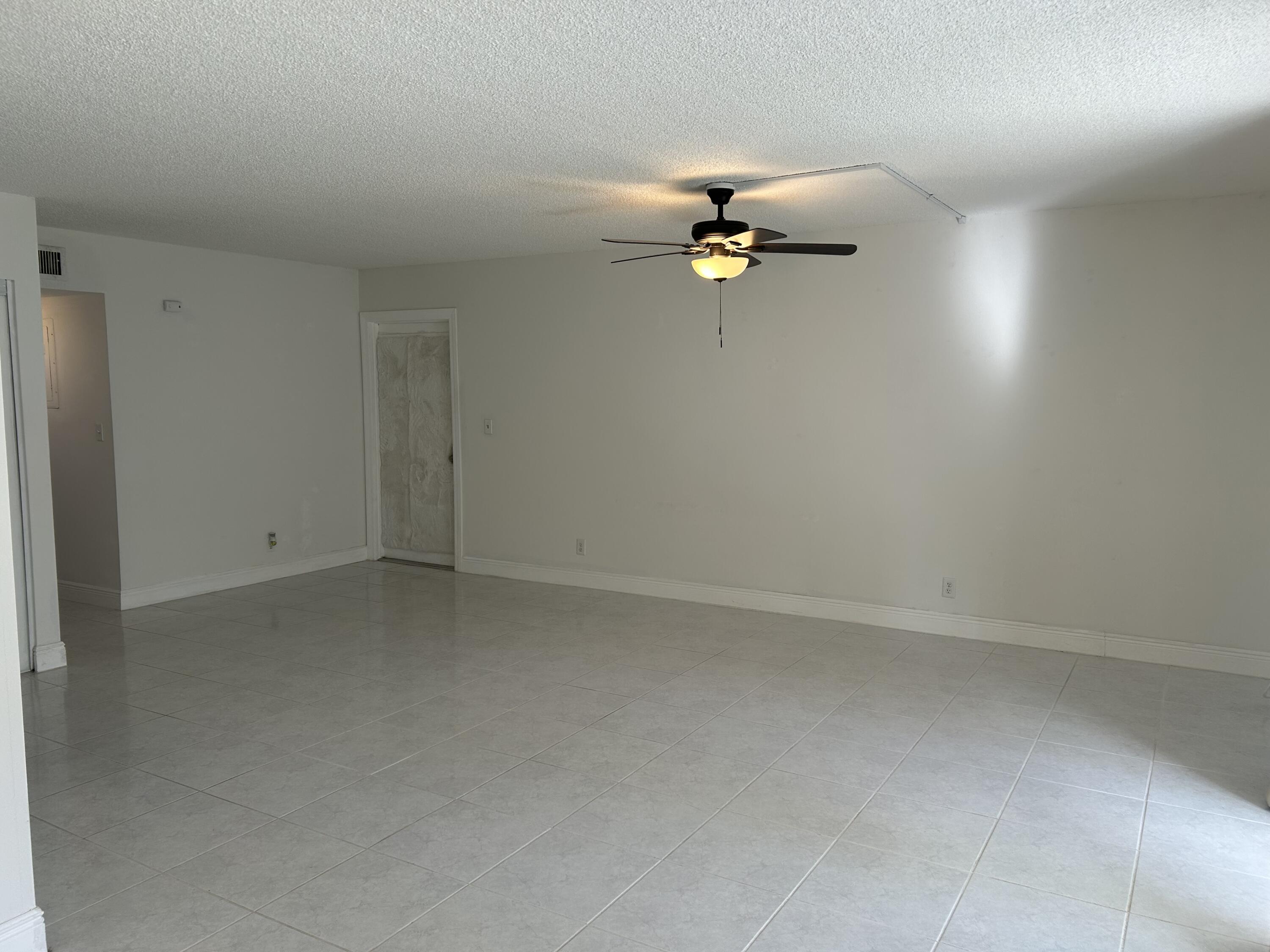 6514 Spring Bottom Way, Unit 125 Boca Raton, FL 33433 - Photo 11 of 27 Neutral Tile Flooring Throughout