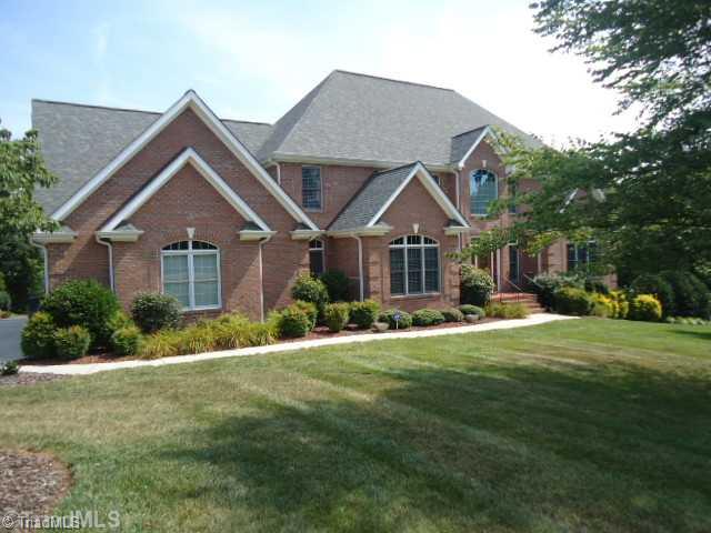 8603 Rosedale Drive Oak Ridge, NC 27310 - Photo 1 of 16 Exterior Front.