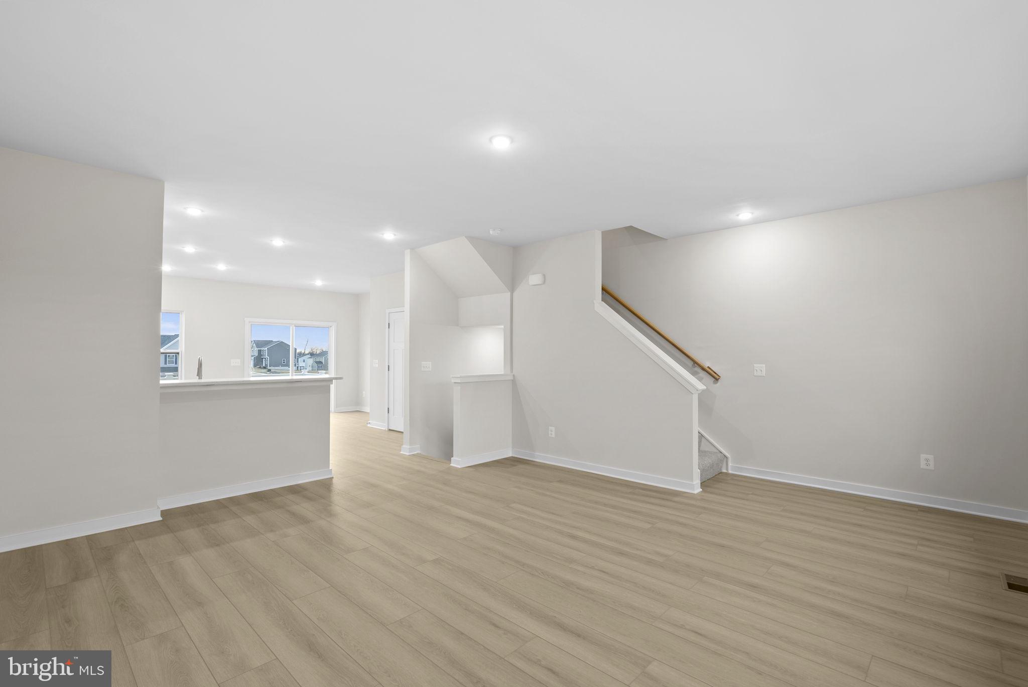 2233 Sherman Avenue Ranson, WV 25438 - Photo 12 of 50 a view of empty room with wooden floor