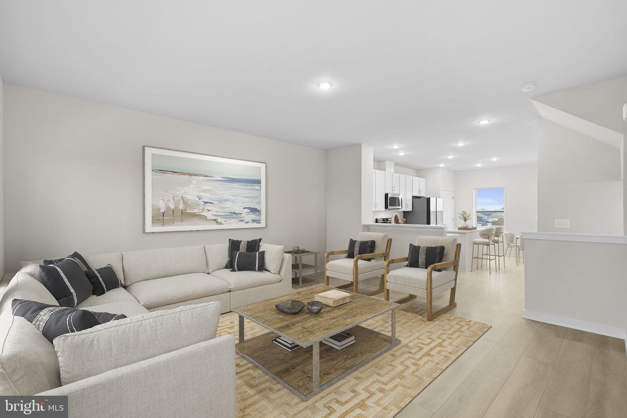 2233 Sherman Avenue Ranson, WV 25438 - Photo 14 of 50 a living room with furniture and a view of kitchen