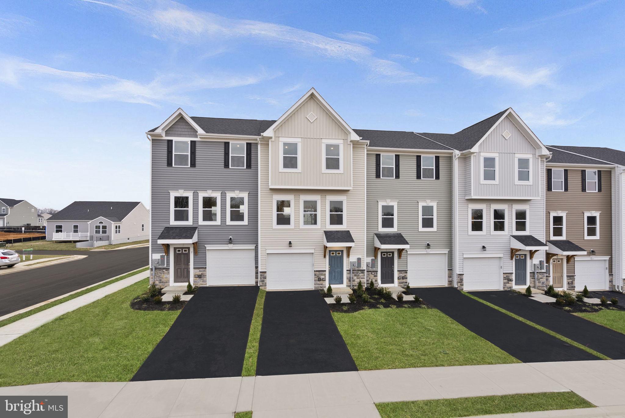 2233 Sherman Avenue Ranson, WV 25438 - Photo 4 of 50 a front view of a house with a yard