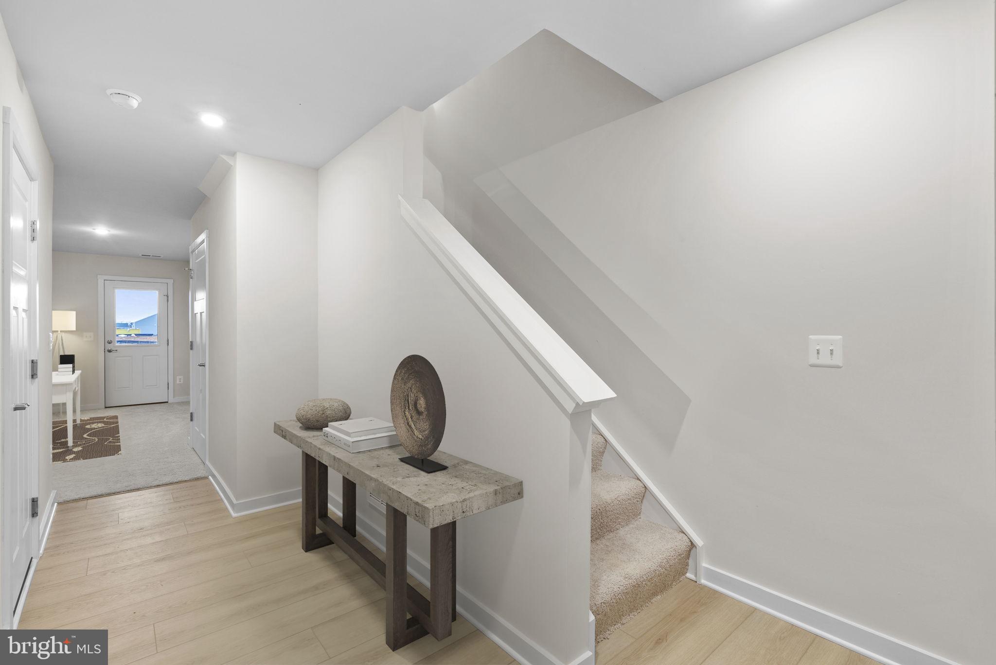 2233 Sherman Avenue Ranson, WV 25438 - Photo 7 of 50 a living room with furniture and a potted plant