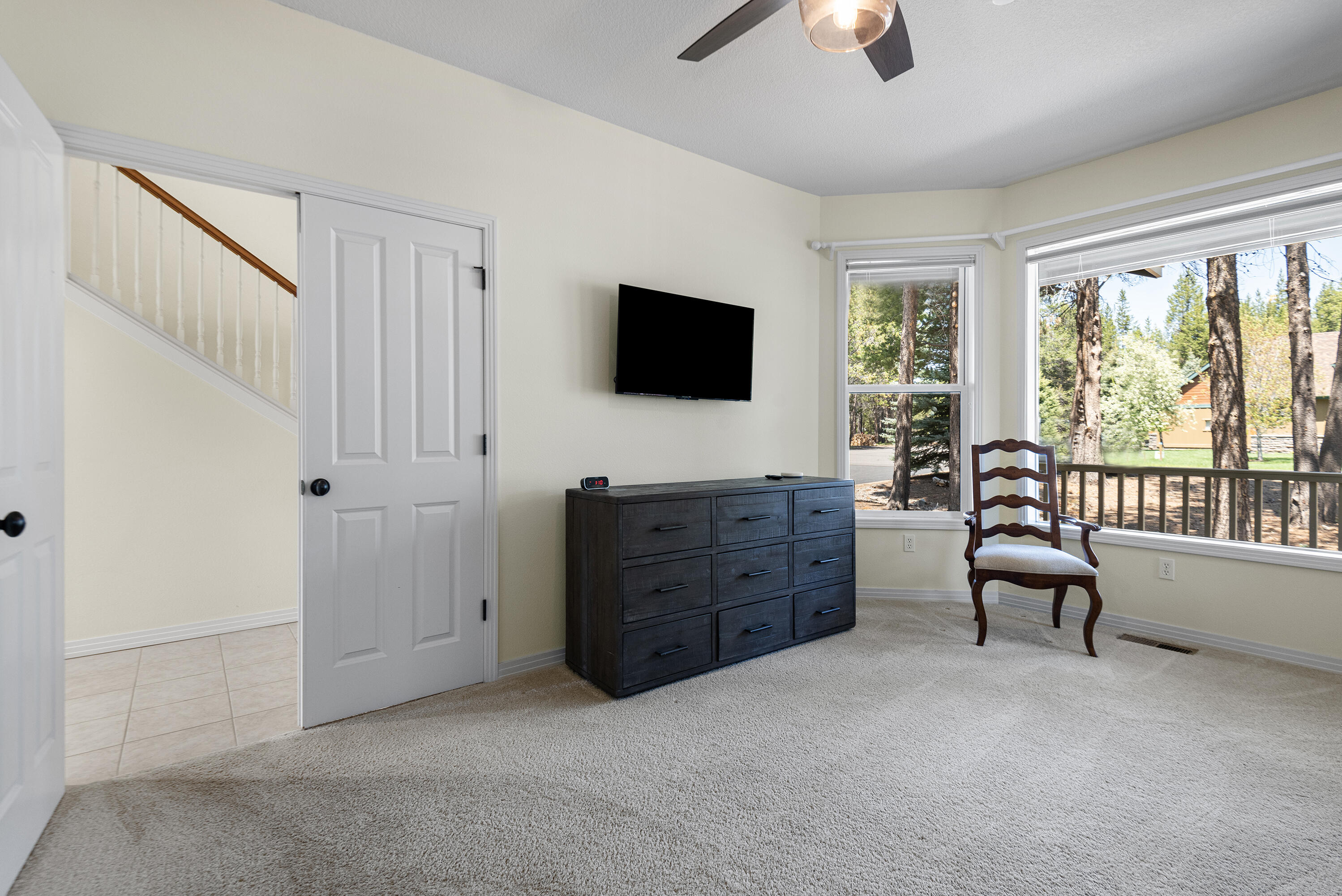 16775 Pony Express Way Bend, OR 97707 - Photo 12 of 38 a living room with furniture and a flat screen tv