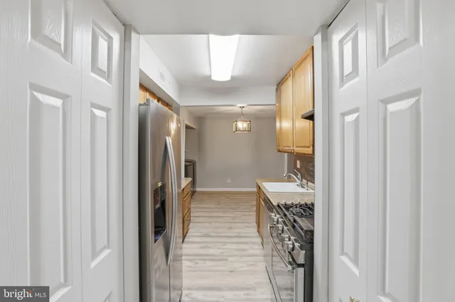 a bathroom with a mirror and a shower