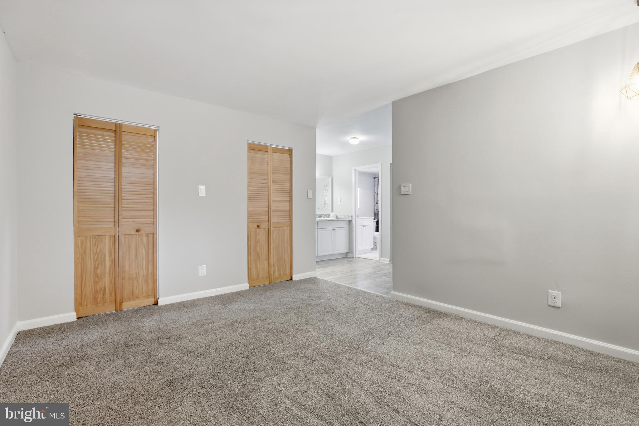 11242 Cherry Hill Road, Unit 1 Beltsville, MD 20705 - Photo 27 of 31 a view of an empty room and closet area