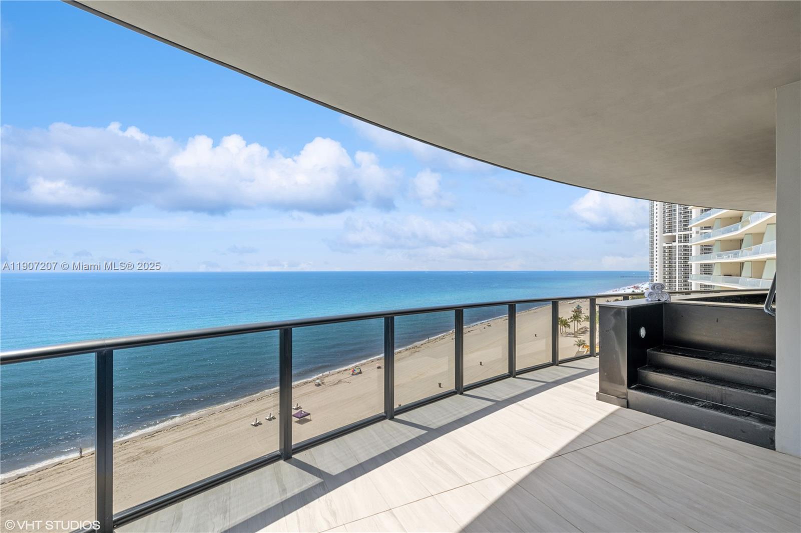 18555 Collins Avenue, Unit 1101 Sunny Isles Beach, FL 33160 - Photo 5 of 46 a view of city from balcony