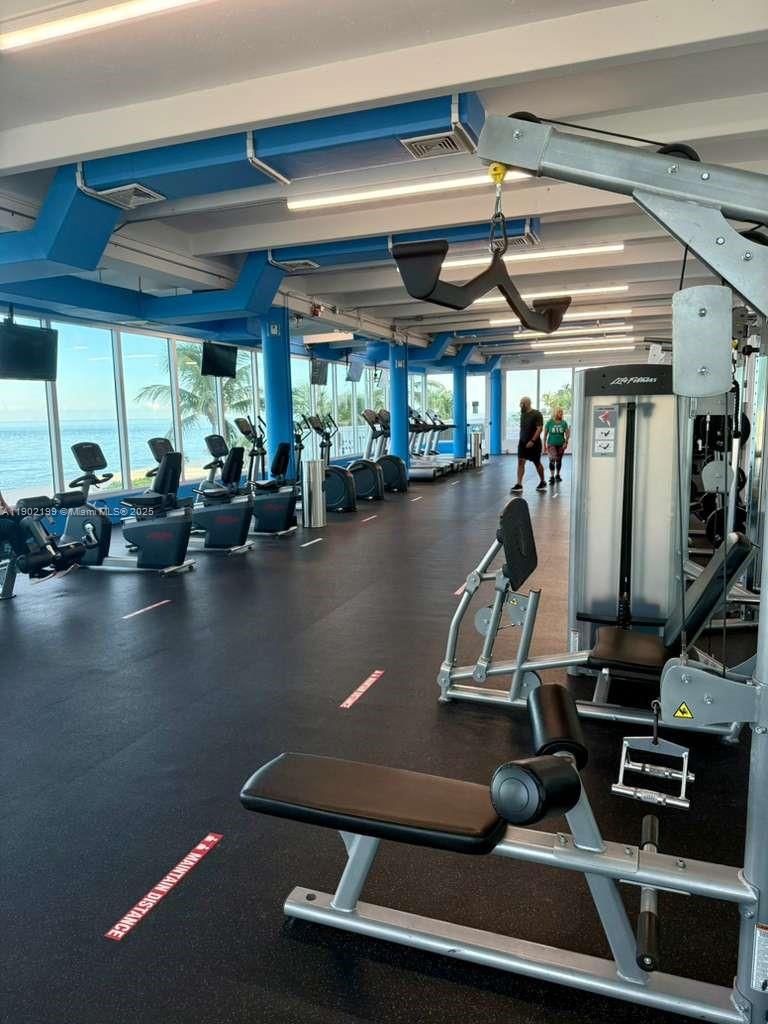 5401 Collins Avenue, Unit 131 Miami Beach, FL 33140 - Photo 25 of 33 a view of a room with gym equipment