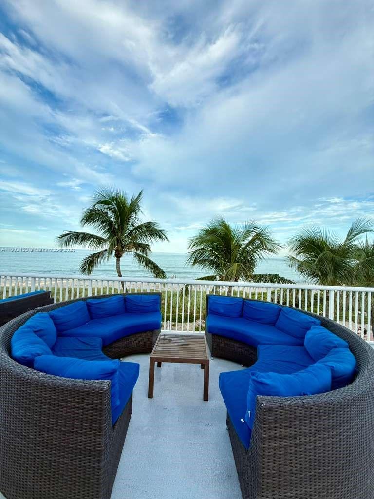 5401 Collins Avenue, Unit 131 Miami Beach, FL 33140 - Photo 27 of 33 a view of patio with swimming pool and furniture