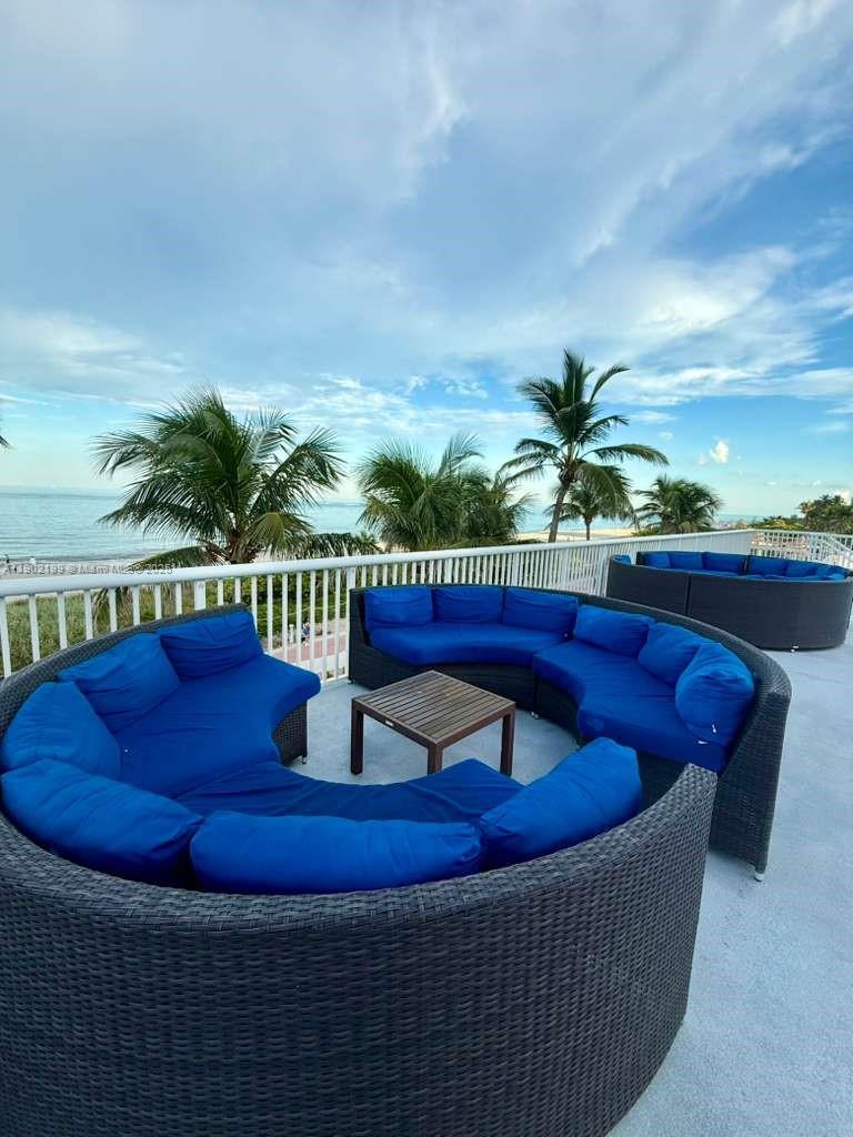 5401 Collins Avenue, Unit 131 Miami Beach, FL 33140 - Photo 28 of 33 a view of swimming pool with seating space