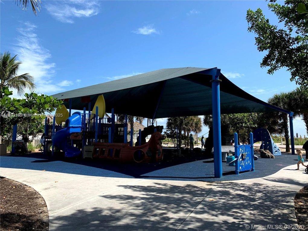 5401 Collins Avenue, Unit 131 Miami Beach, FL 33140 - Photo 33 of 33 a view of a building with a street