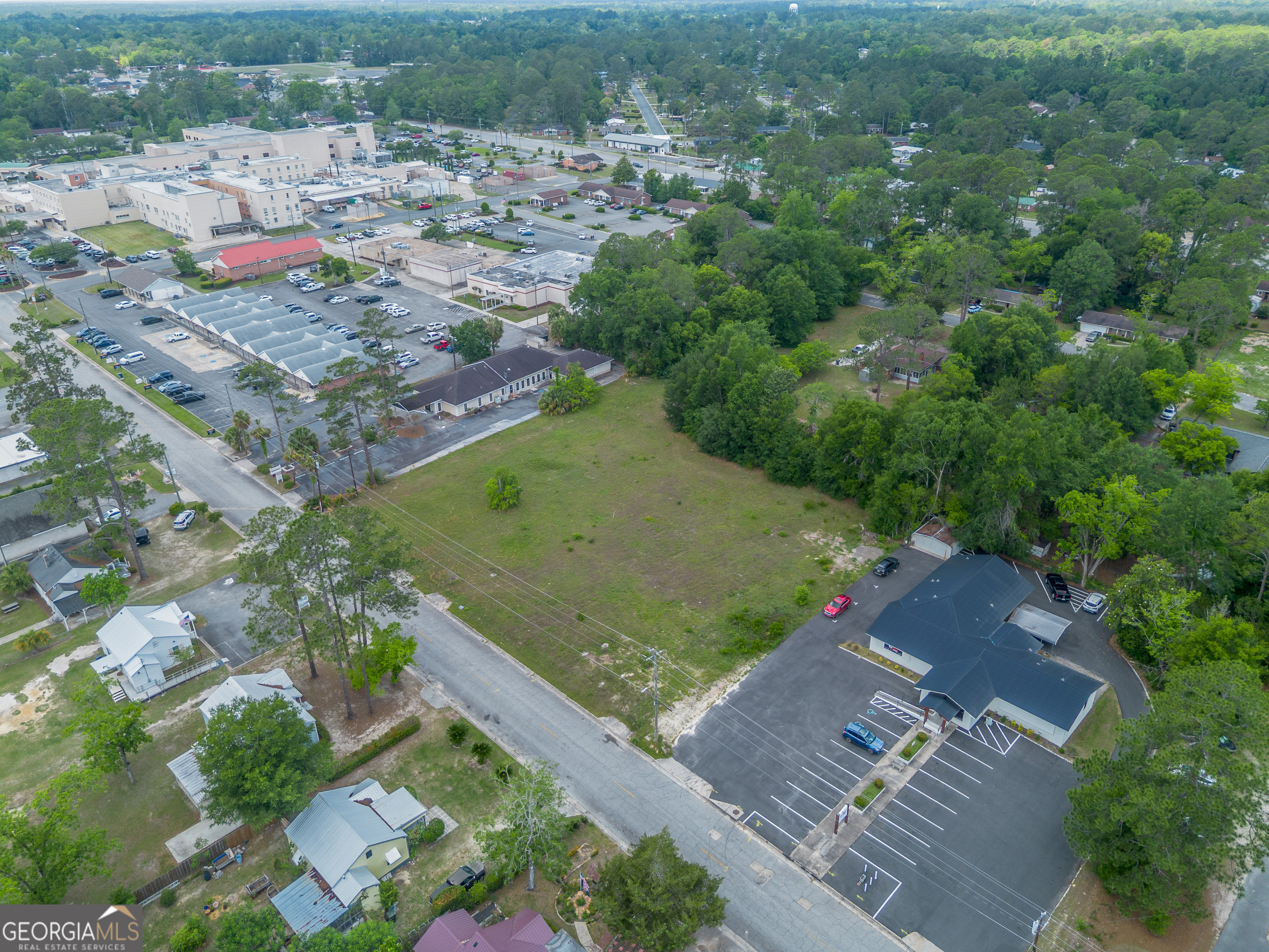 2011 Alice Street Waycross, GA 31501 - Photo 6 of 12 an aerial view of residential houses with outdoor space
