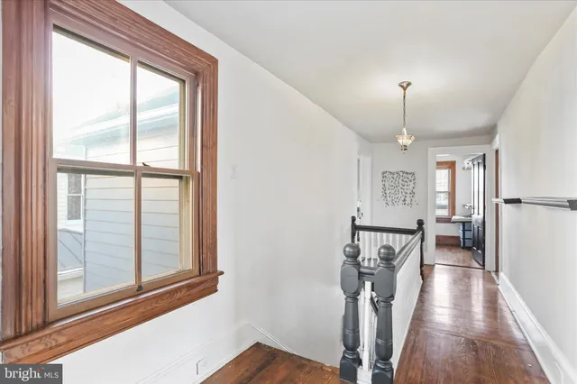 a room with furniture and a wooden floor