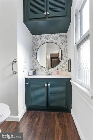 a view of a chair and table in the balcony