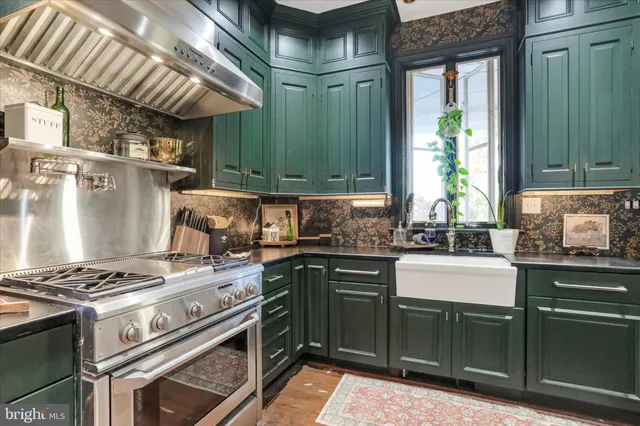 a bathroom with a sink a mirror and a window