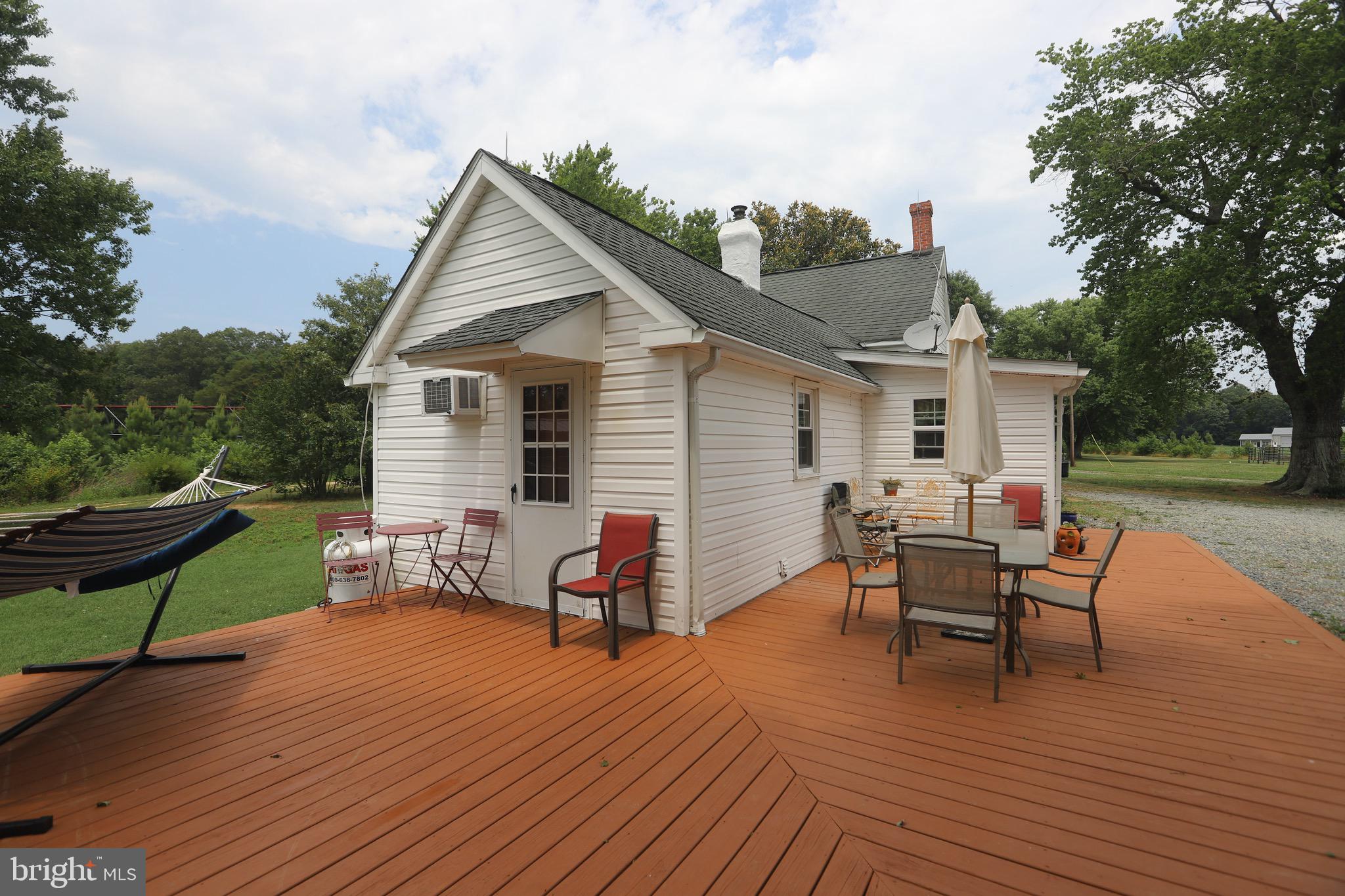 25439 Towers Road Denton, MD 21629 - Photo 16 of 40 a view of a house with lounge chair