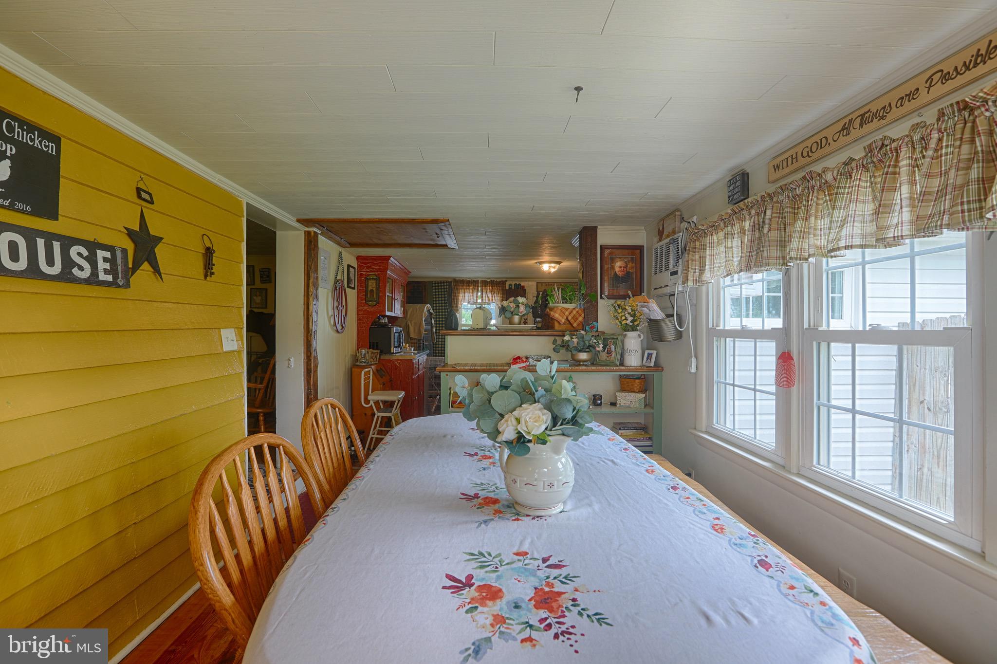 25439 Towers Road Denton, MD 21629 - Photo 17 of 40 a lobby with furniture and a potted plant