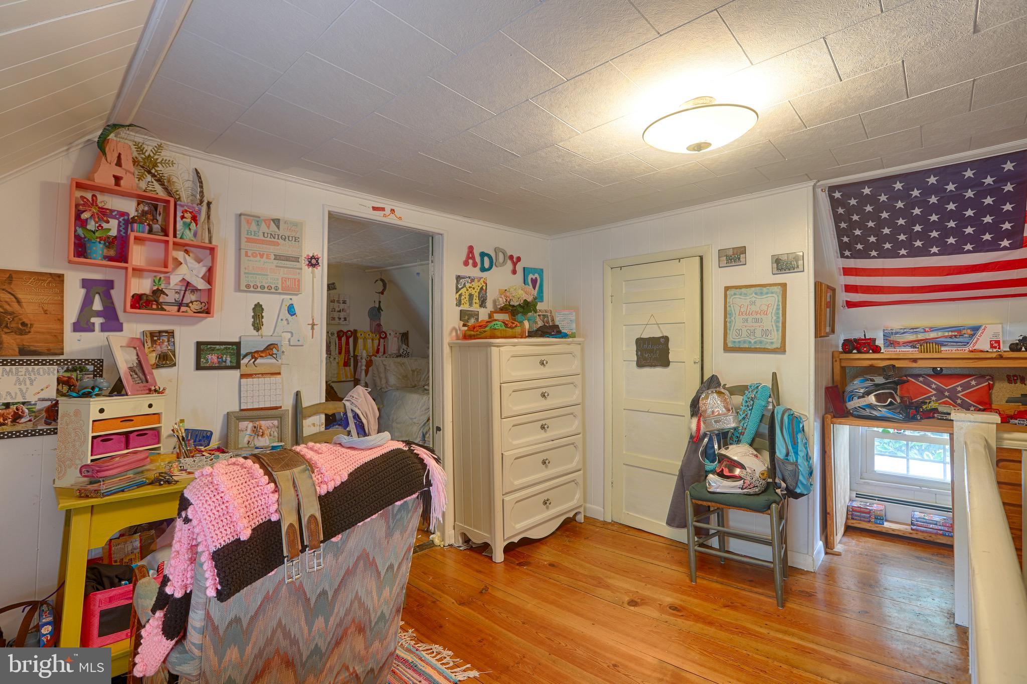 25439 Towers Road Denton, MD 21629 - Photo 30 of 40 a bedroom with furniture and a closet