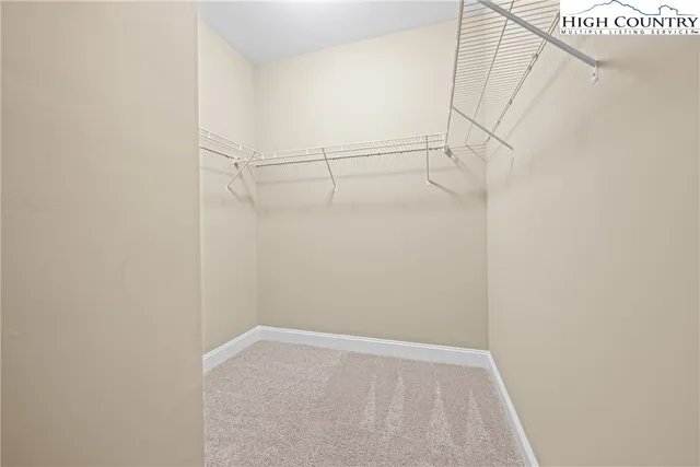 a view of a room with racks on the wall