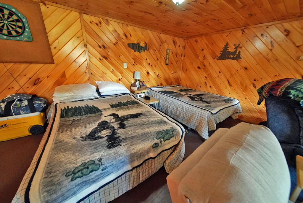 777 Bancroft Road Weston, ME 04424 - Photo 17 of 59 me-camp-home-bedroom