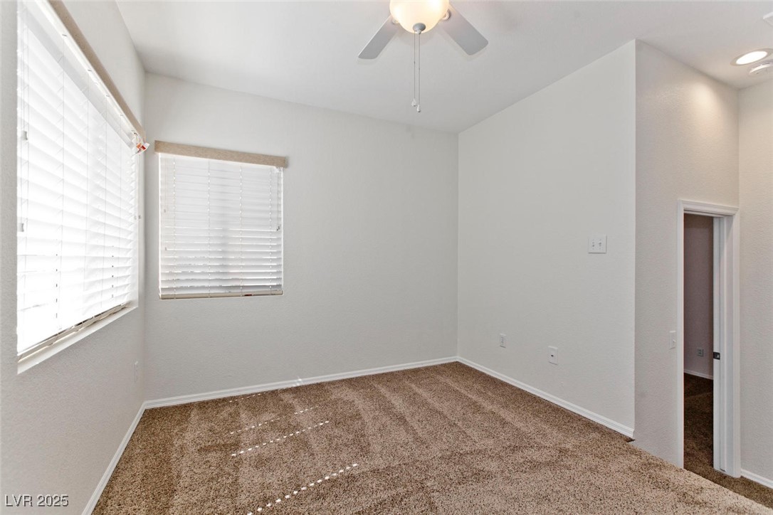 1663 Cloister Avenue Henderson, NV 89014 - Photo 19 of 35 Carpeted spare room with healthy amount of natural