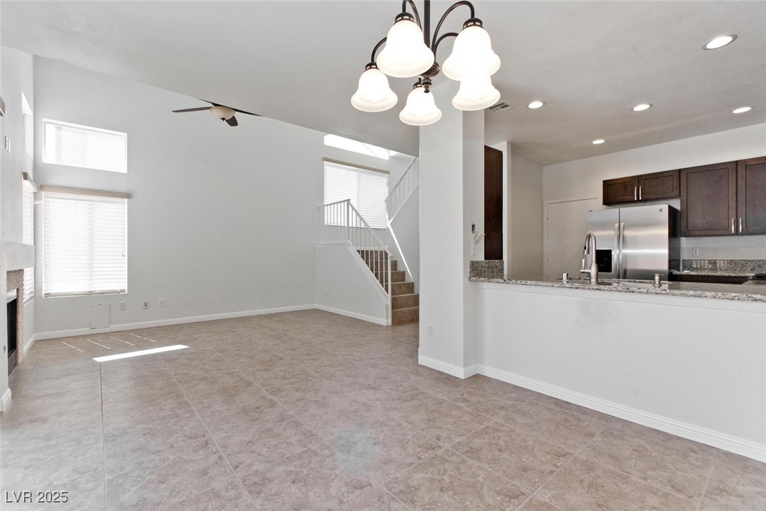 1663 Cloister Avenue Henderson, NV 89014 - Photo 10 of 35 Kitchen featuring stainless steel refrigerator wit