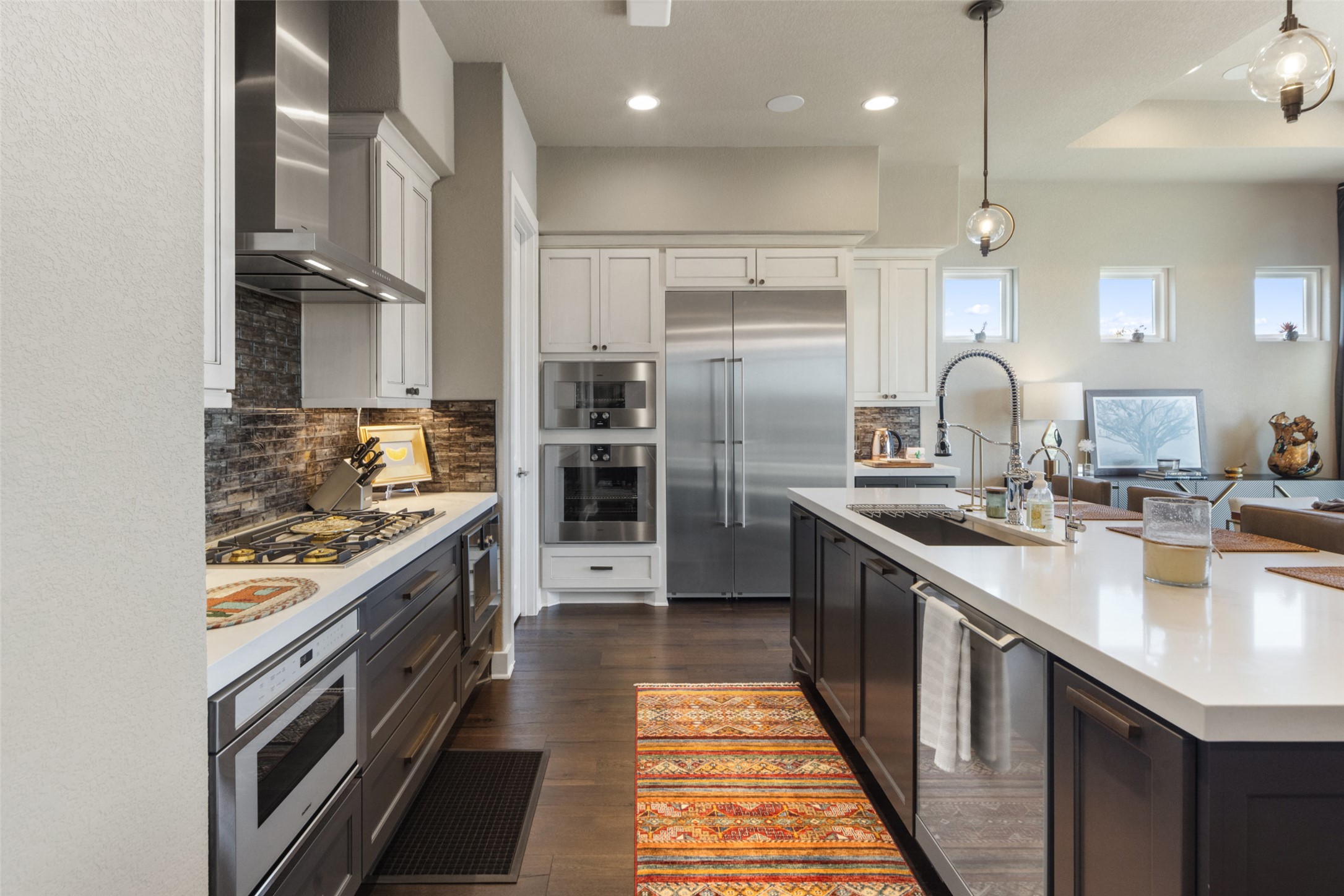420 Marina View Way Austin, TX 78734 - Photo 12 of 32 a kitchen with stainless steel appliances a sink stove and refrigerator