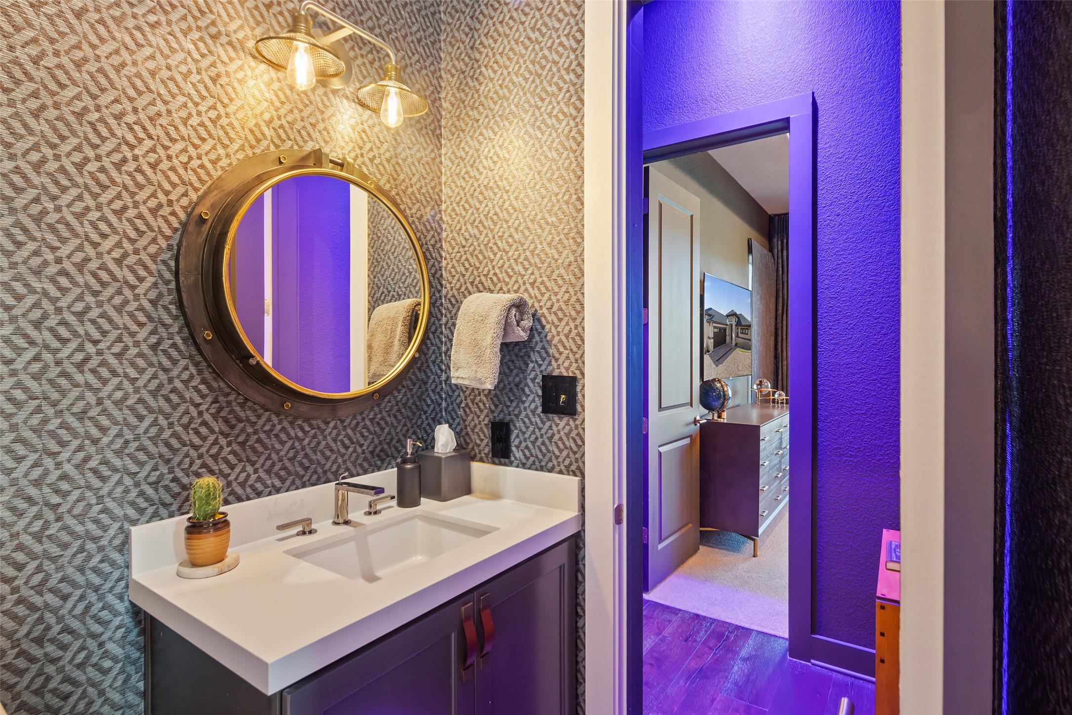 420 Marina View Way Austin, TX 78734 - Photo 22 of 32 a bathroom with a sink and a mirror