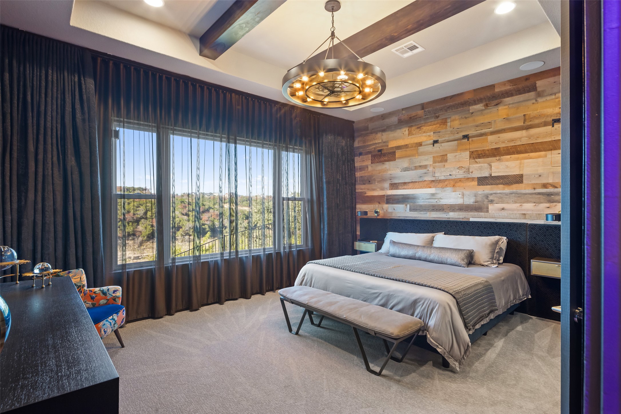 420 Marina View Way Austin, TX 78734 - Photo 24 of 32 a bedroom with a bed and a large window