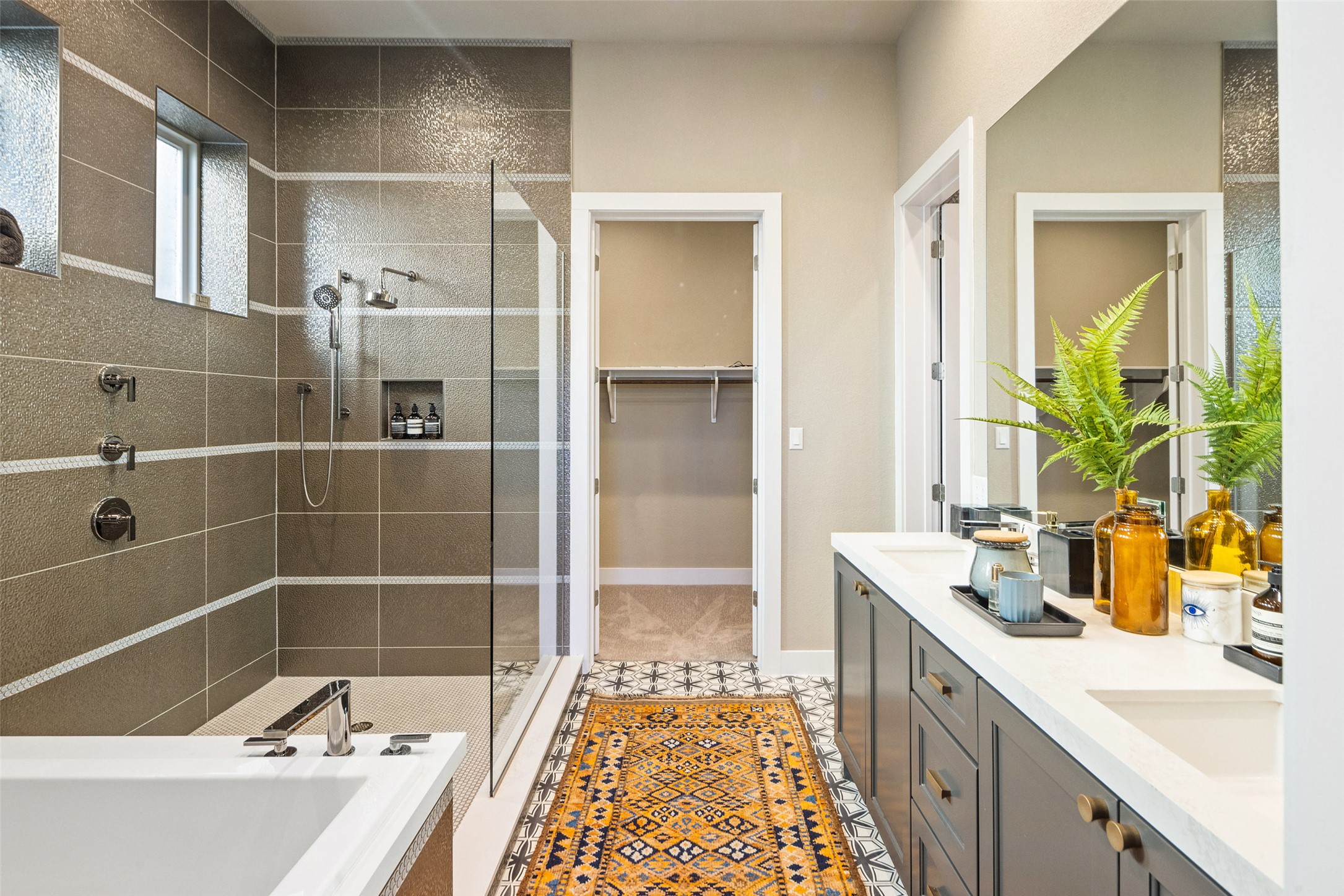 420 Marina View Way Austin, TX 78734 - Photo 25 of 32 a bathroom with a bathtub and a sink