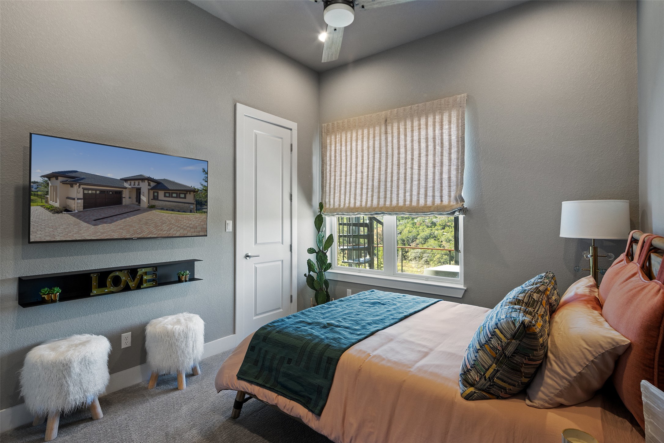 420 Marina View Way Austin, TX 78734 - Photo 27 of 32 a bedroom with a bed and window