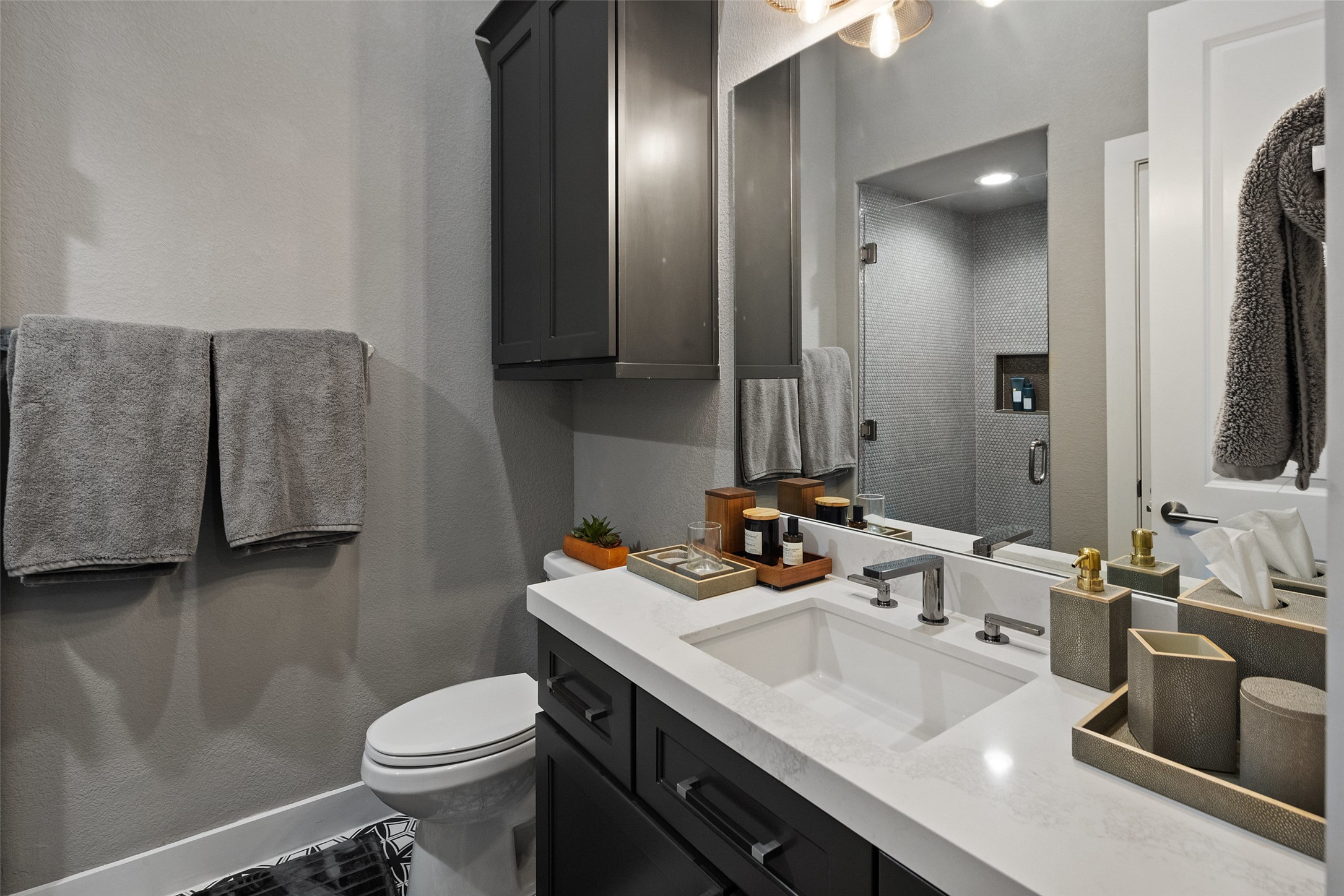 420 Marina View Way Austin, TX 78734 - Photo 28 of 32 a bathroom with a sink and a mirror