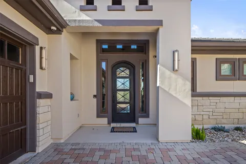 a front view of a house with barbeque