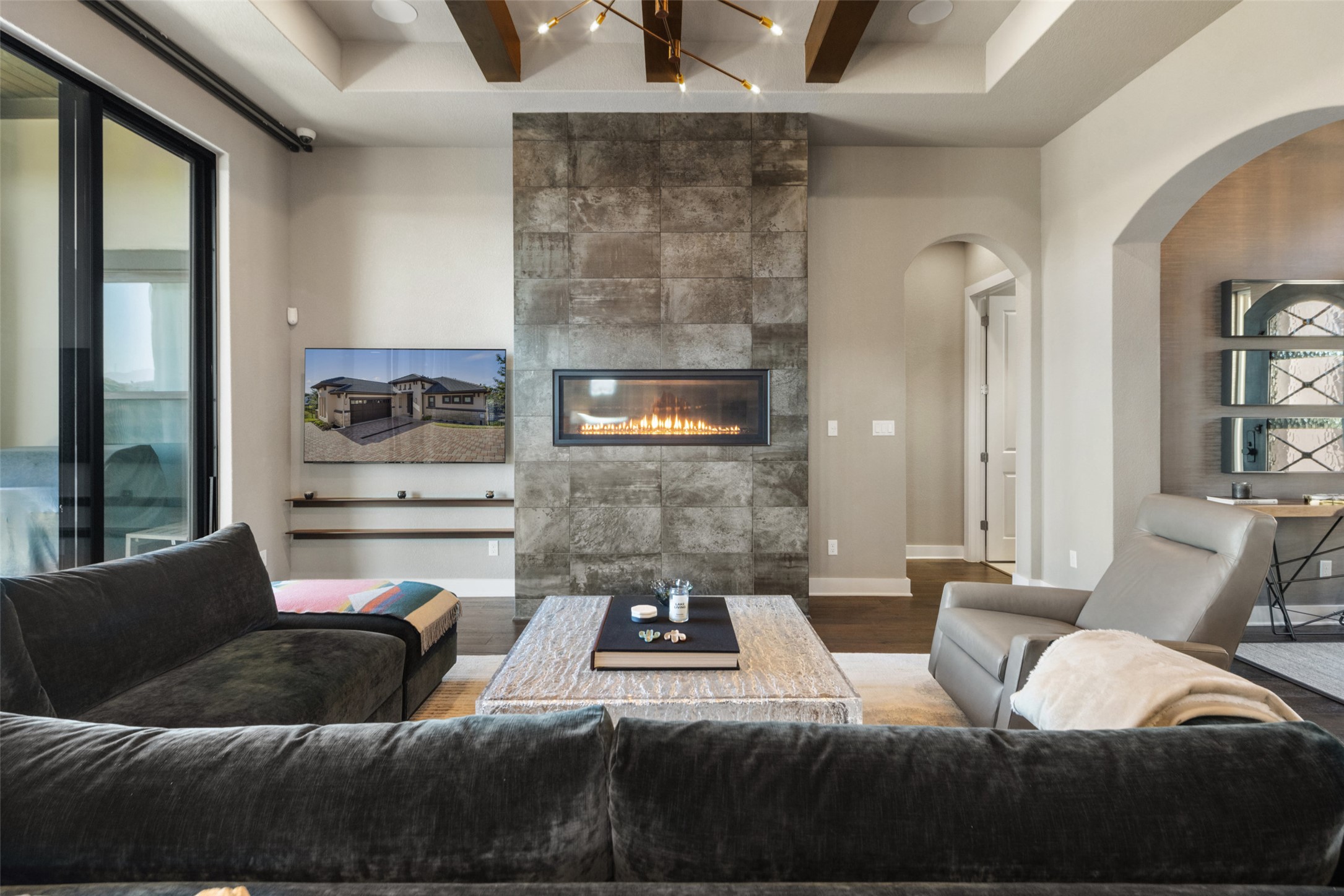 420 Marina View Way Austin, TX 78734 - Photo 8 of 32 a living room with furniture and a fireplace