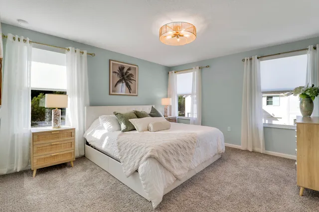 a bedroom with a bed and a cabinets