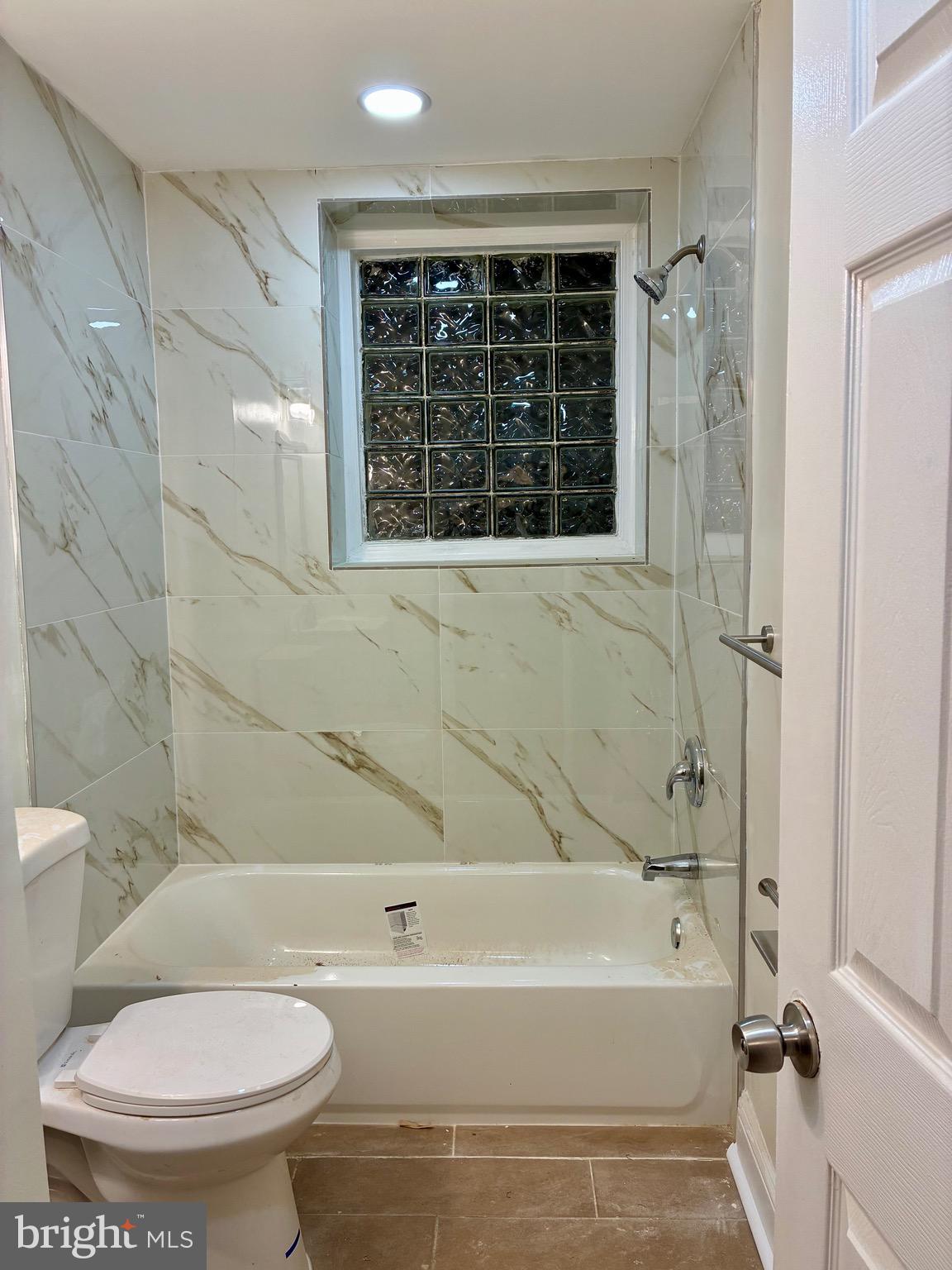 2704 Marbourne Avenue Baltimore, MD 21230 - Photo 21 of 46 a bathroom with a toilet and a bathtub