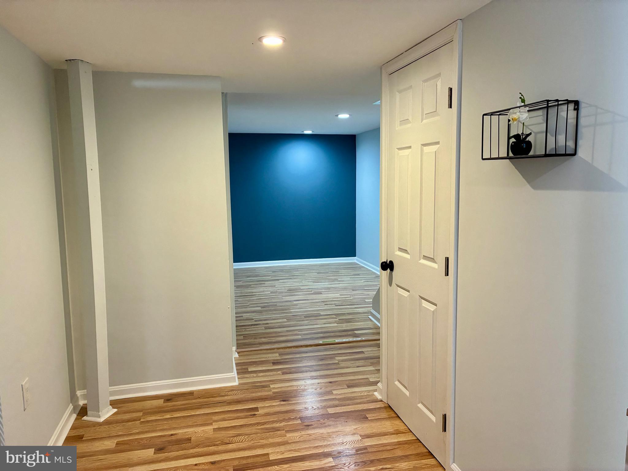 2704 Marbourne Avenue Baltimore, MD 21230 - Photo 33 of 46 a view of hallway with wooden floor