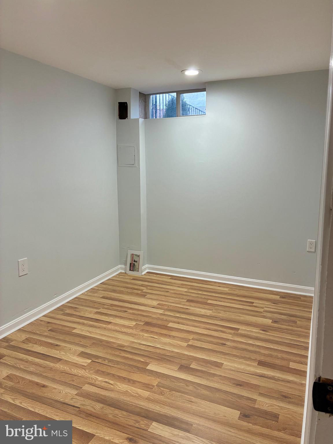 2704 Marbourne Avenue Baltimore, MD 21230 - Photo 40 of 46 a view of empty room with wooden floor