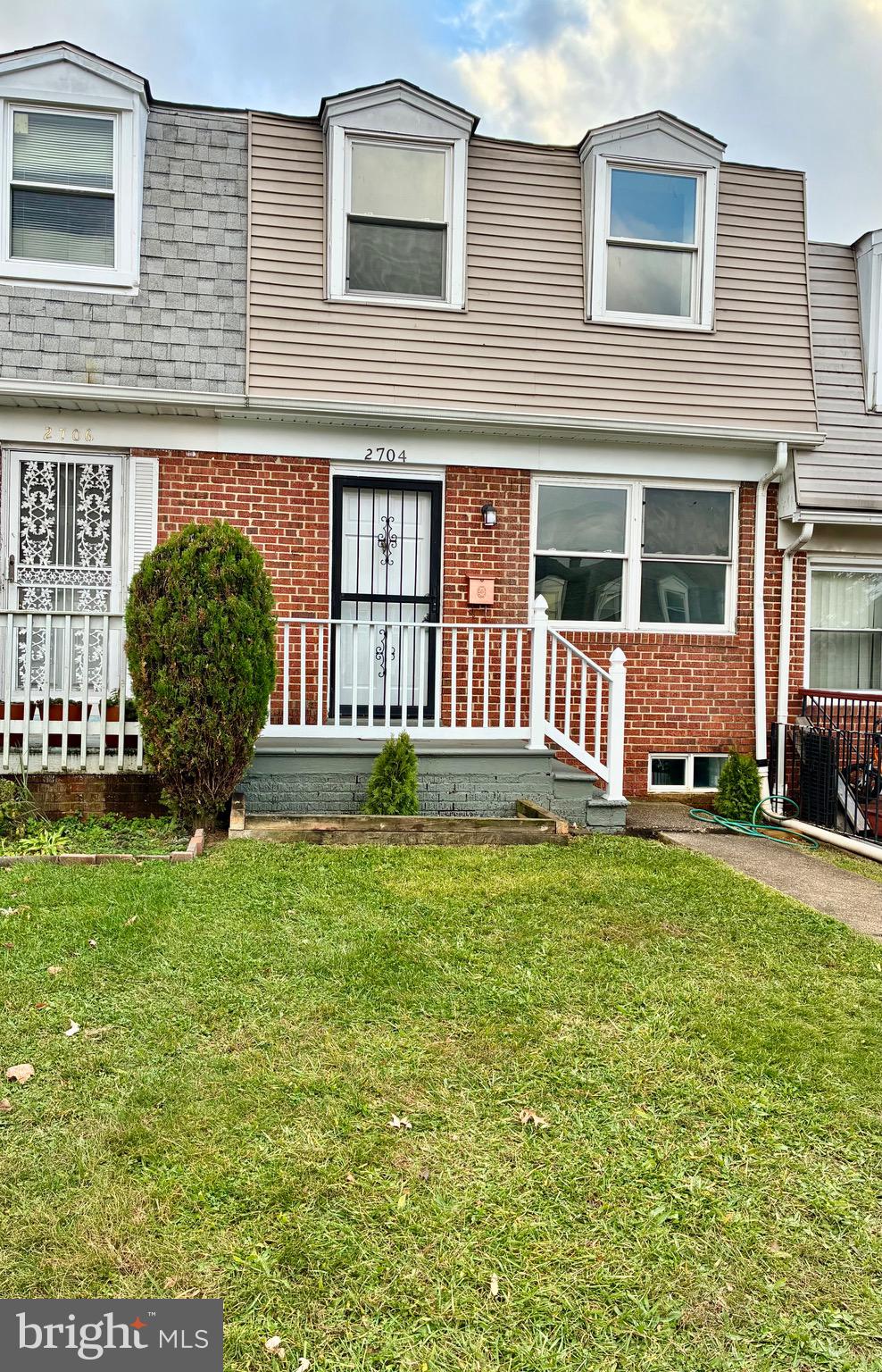 2704 Marbourne Avenue Baltimore, MD 21230 - Photo 43 of 46 a front view of a house with garden