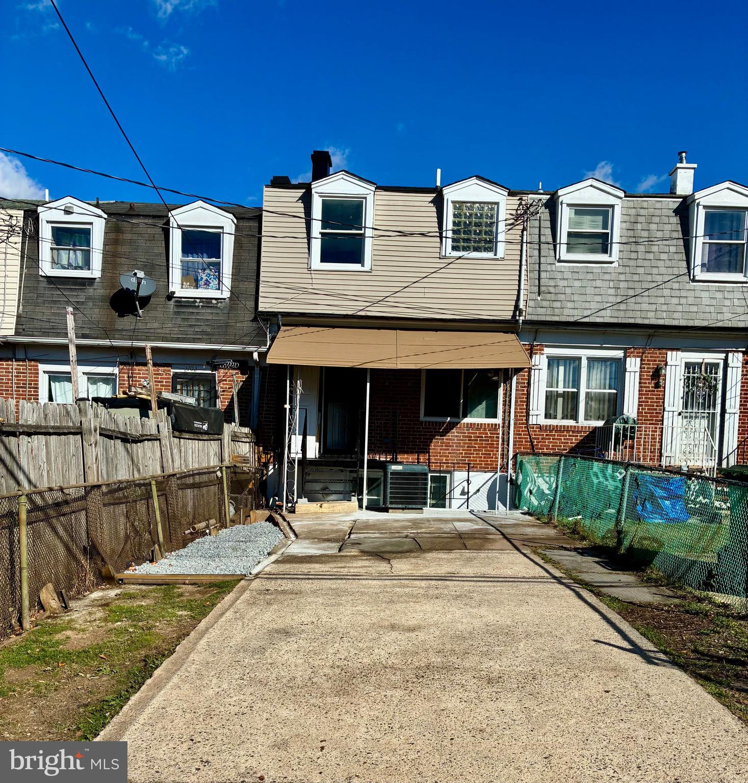 2704 Marbourne Avenue Baltimore, MD 21230 - Photo 44 of 46 a front view of a house with a yard outdoor seating and barbeque oven