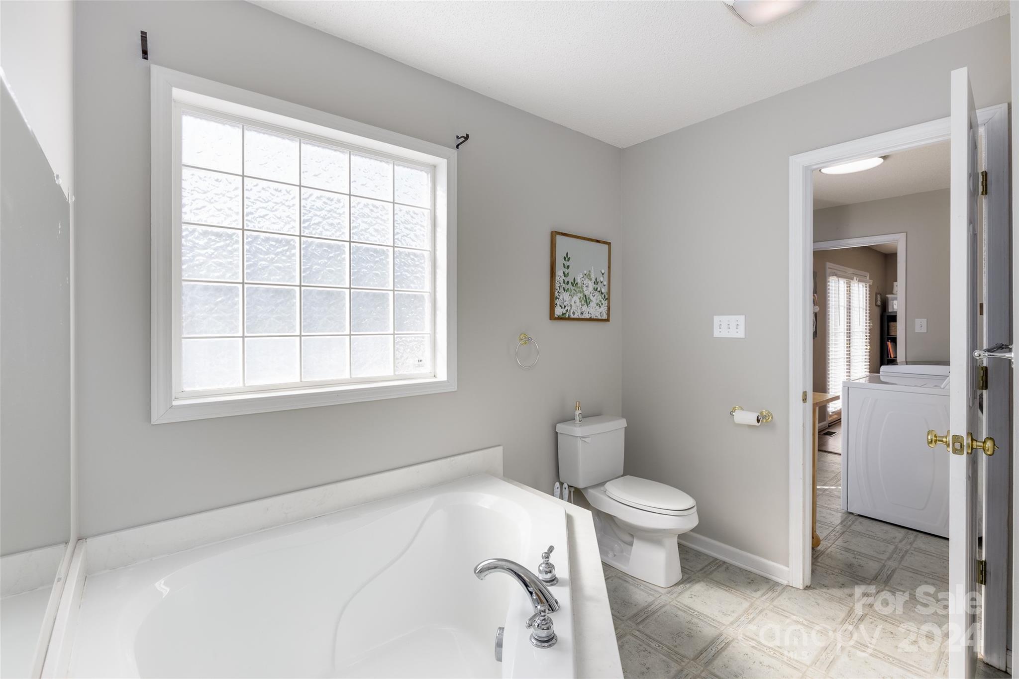 223 Adrian Road Salisbury, NC 28146 - Photo 17 of 34 a bathroom with a toilet and a shower