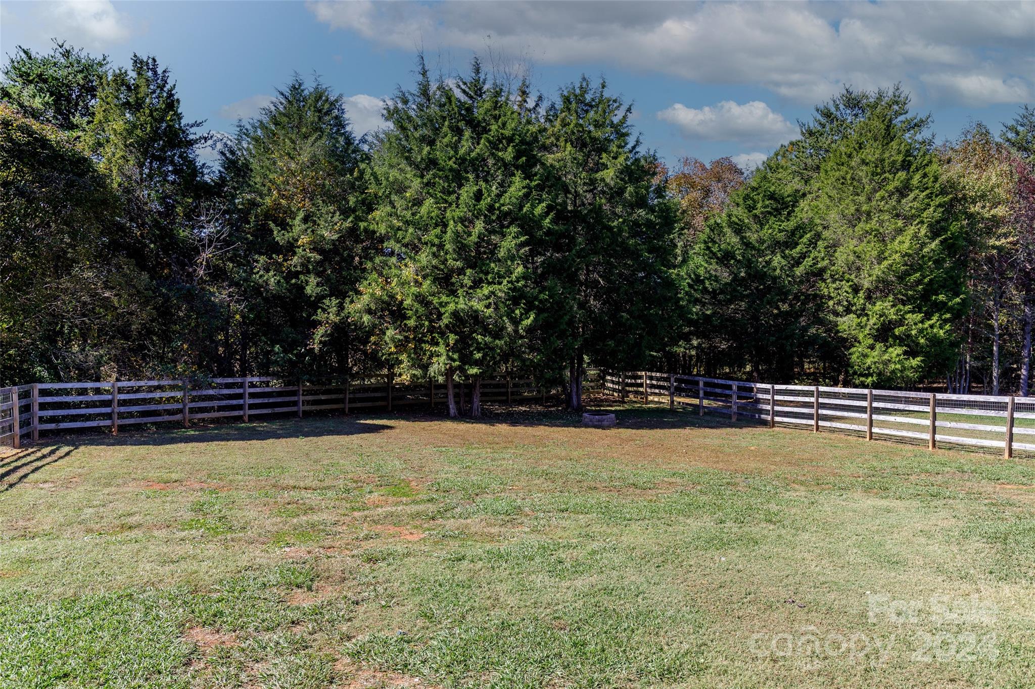223 Adrian Road Salisbury, NC 28146 - Photo 2 of 34 a view of a swimming pool with an outdoor seating and a yard