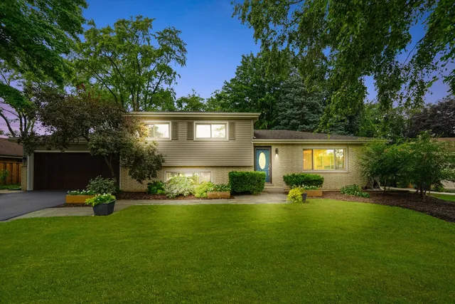 a view of a house with a yard porch and sitting area